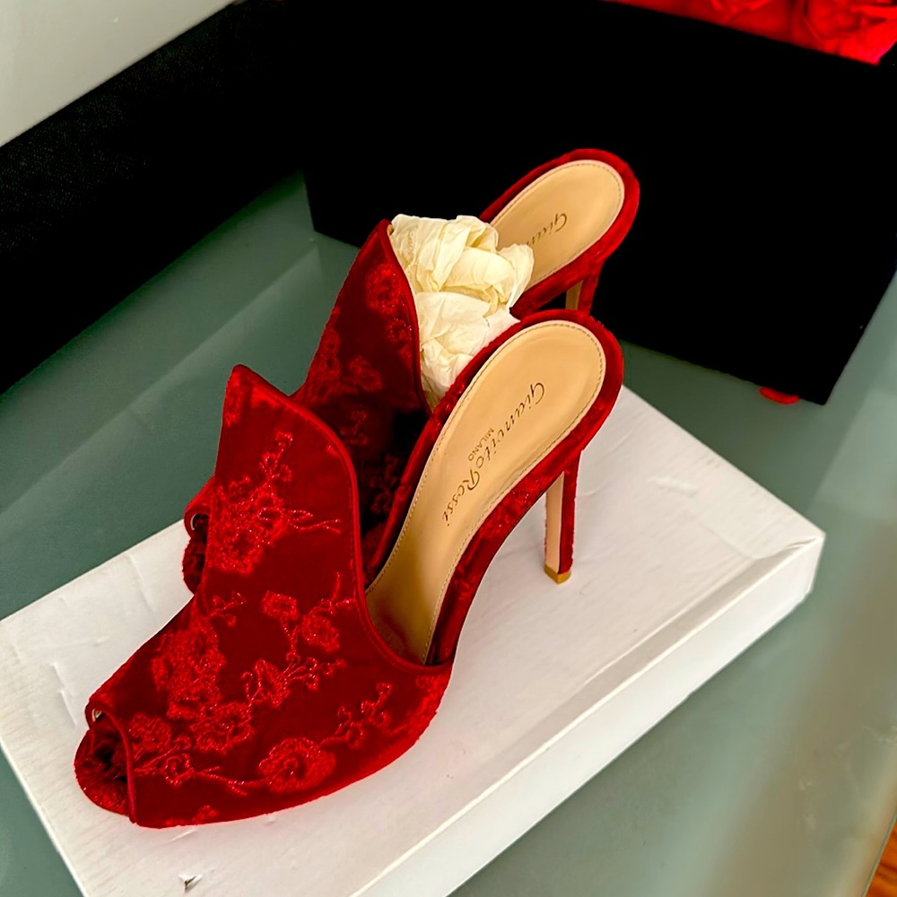 Red pair of Gianvito Rossi heels size nine